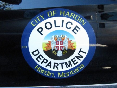 The logo on a Mercedes SUV brought to Hardin by a California security company that wants to take over Hardin's empty jail is seen in this photo from Thursday in Hardin. The city has not had a police force for three decades.